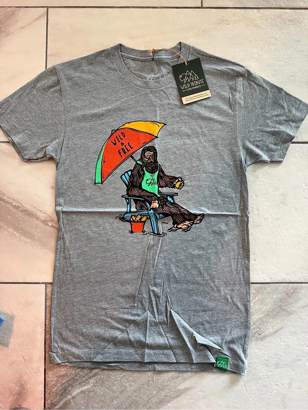 Wild Tribute "Wild & Free" Sasquatch Beach Graphic Short Sleeve Tee in Gray, XS